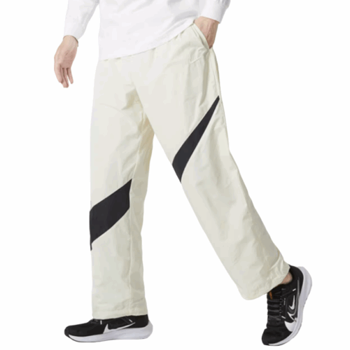 Spodnie sportowe Nike Swoosh kreszowe kremowe